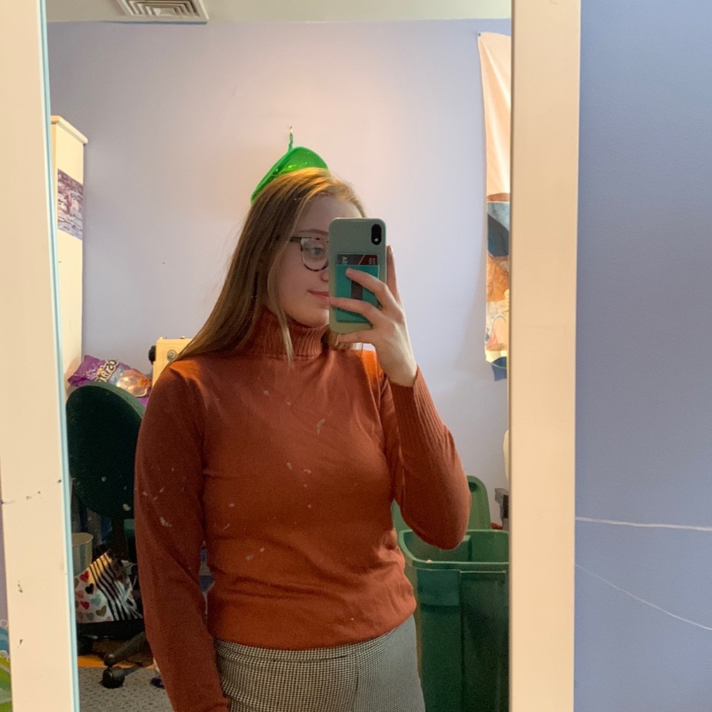 burnt orange turtle neck